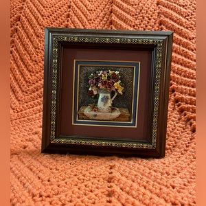 Source unknown on the brand but,I think it’s beautiful, 63/4x63/4,framed w/stand